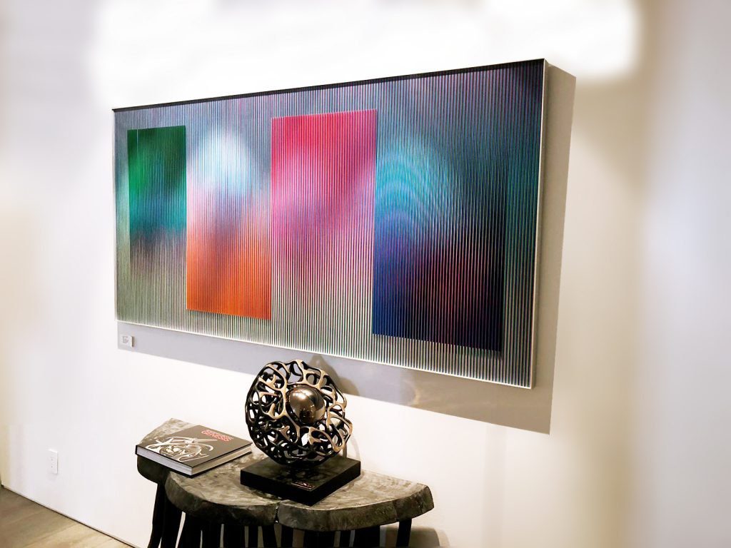 Sfera Vega’ sculpture by Gianfranco Meggiato and Painting by Cruz Diez, capturing the star's brilliance in Boccara Gallery